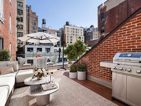 2nd image of 256 W 75th St Unit Townhouse