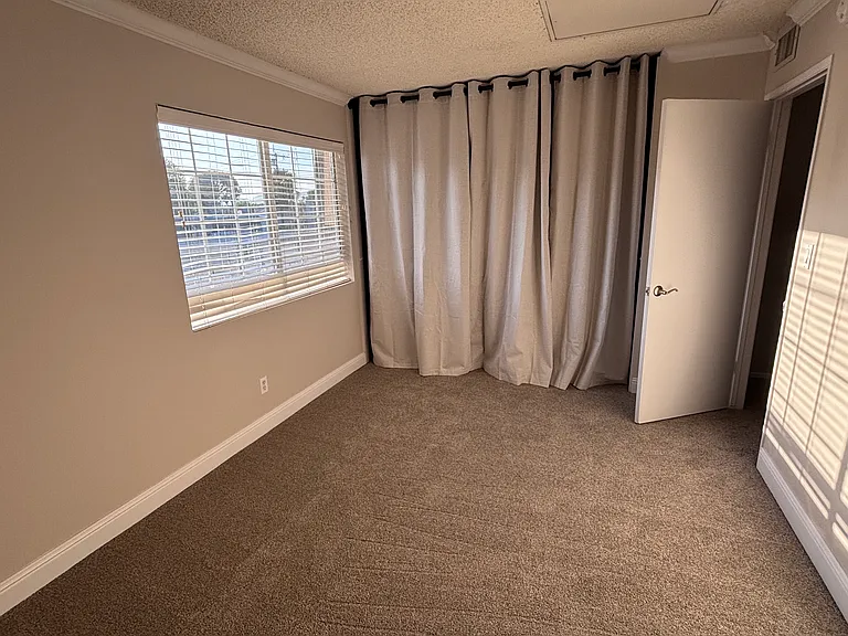 Bedroom 2 - closet behind curtain