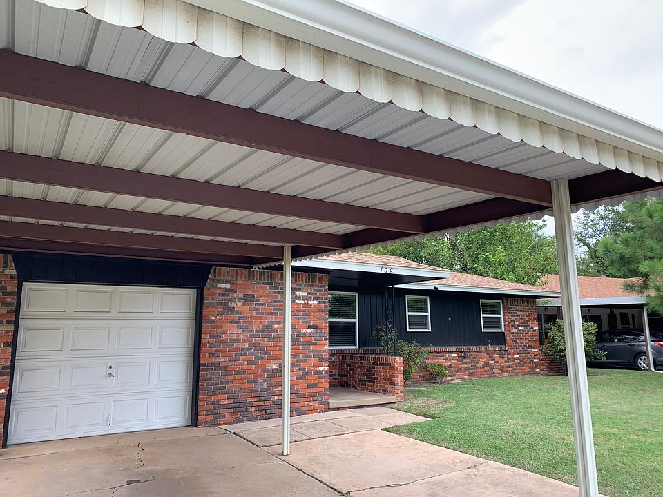 Front of the house with carport