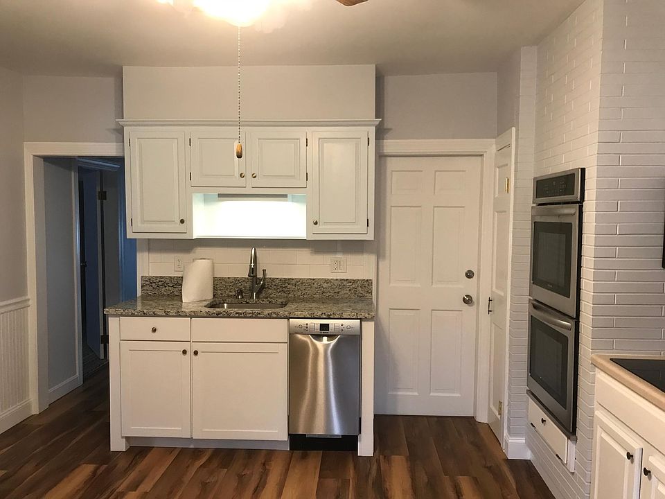 Recently renovated kitchen. Double oven, electric stove, fridge with ice-maker and garbage disposal in the sink.