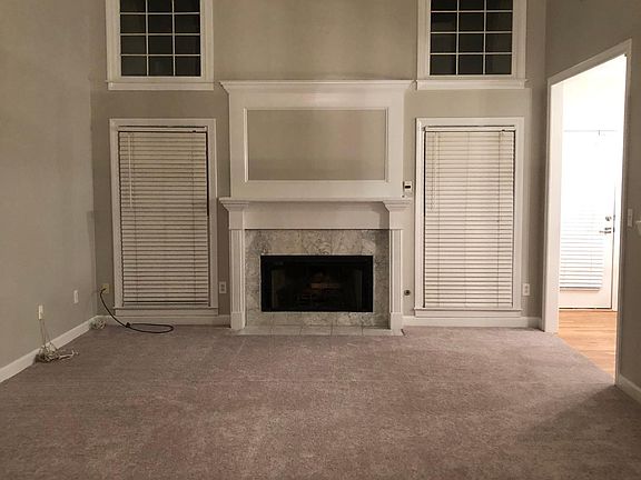 Family Room- vaulted ceiling- bright and light.