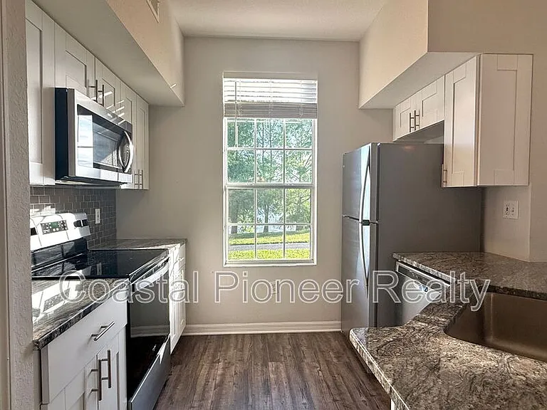 9068 Lake Chase Island Way — Photo 8