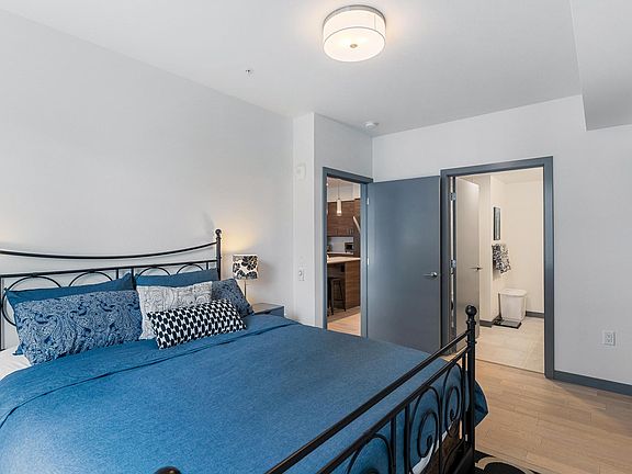 Bedroom has queen bed, enormous walk-in closet, spacious bath
