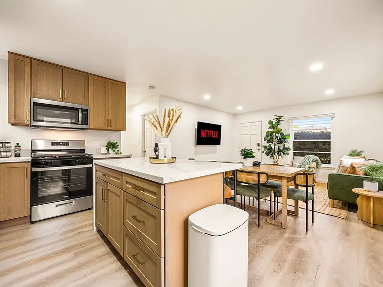 Dining area offers a comfortable space for shared meals, morning coffee, or game nights.