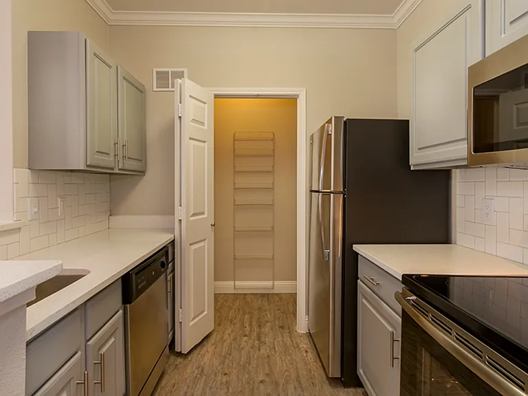 Renovated kitchens with granite countertops & stainless steel appliances
