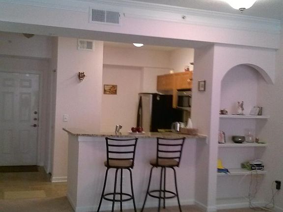 Living Room/Kitchen (the wall color is different than pictured; in the neutral tones now)