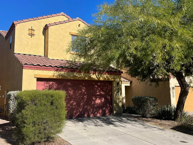 2 stories, 2 car garage and driveway parking