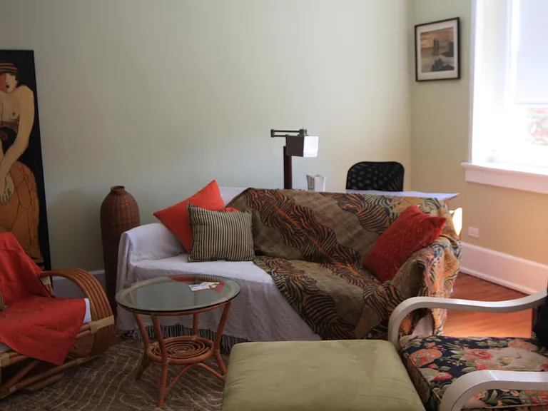 very sunny south facing living room with fireplace