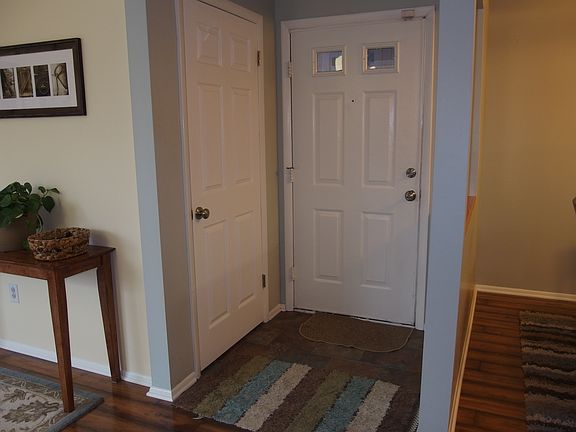 Tile Interior Entrance and Coat Closet