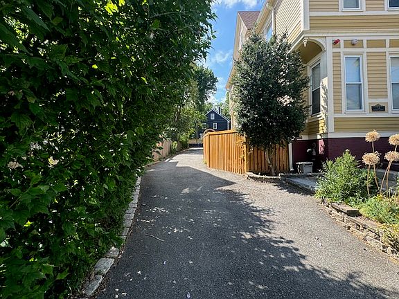 Driveway to the two off-street parking spots.