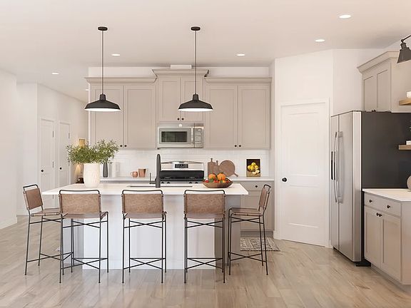 Kitchen with island and pendant lighting