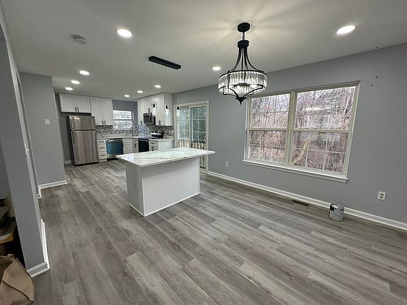 Kitchen with Quartz countertops and all new Stainless steel appliances