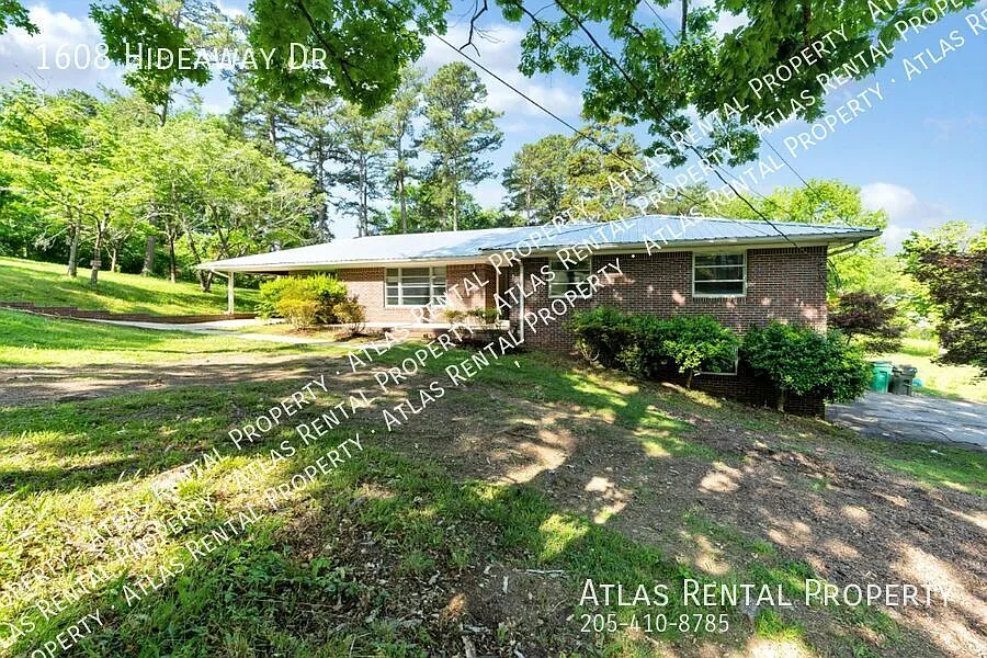 Available Now! Spacious 3BR/2BA with Luxurious Touches! — Photo 2