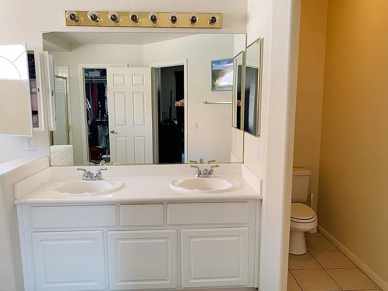 Primary Bathroom Sink. Walk in closet attached to bathroom.