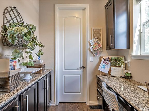 Butler pantry leading to food pantry