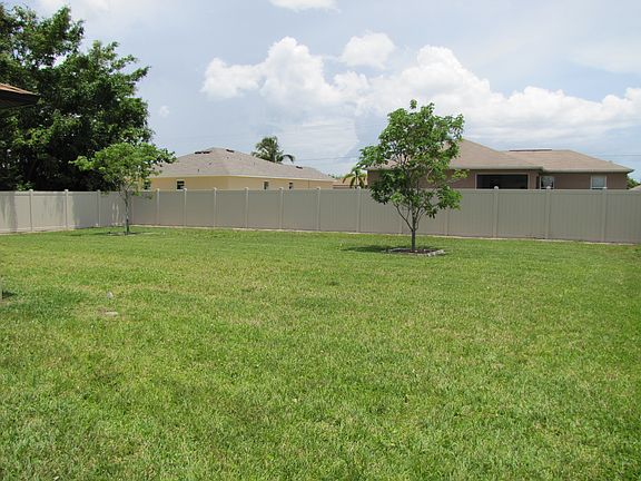 Fenced in back yard with lawn care included.