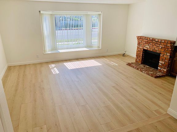 Living room; fireplace is decorative only, not operatable.