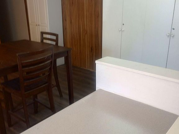 Kitchen with additional cabinets for storage