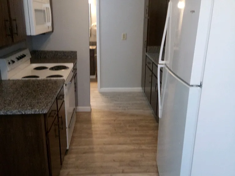 Kitchen looking in from dinning room to bathroom