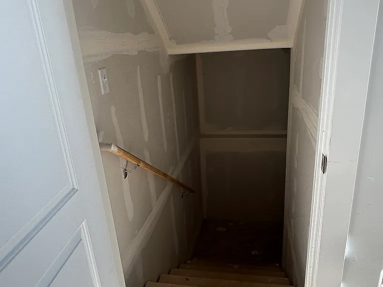 Stairs to unfinished basement