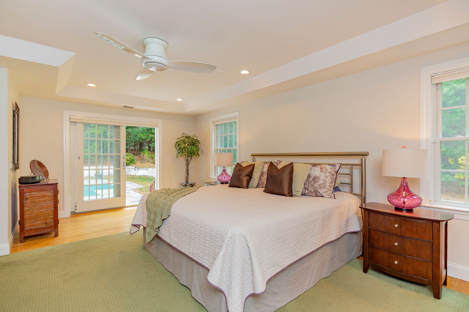  Primary bedroom with sliding doors to patio and pool