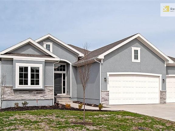 Stucco & Stone Front, Covered Porch & Landscape!