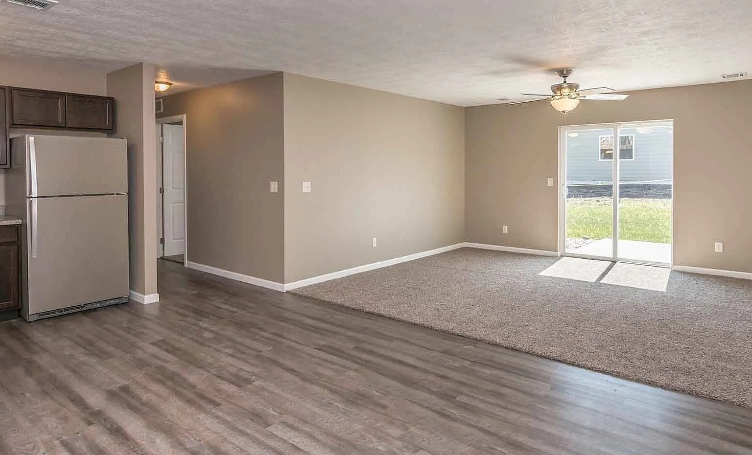 3 Bedroom Barker Crossing Townhome with Attached Garage & In-Unit Laundry — Photo 1