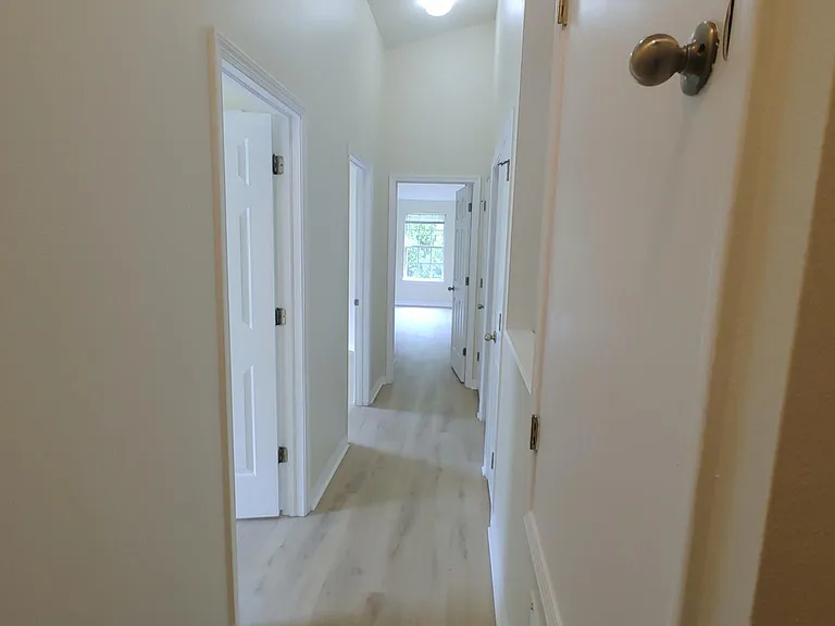 Hallway between bedrooms