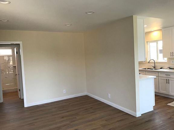Two tone paint throughout the apartment, all new wood floor and recessed lighting in every room.