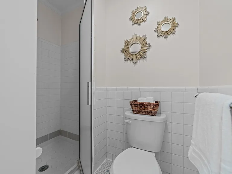 Primary bathroom with glass shower door