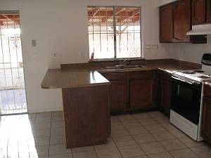 Open kitchen with island and appliances