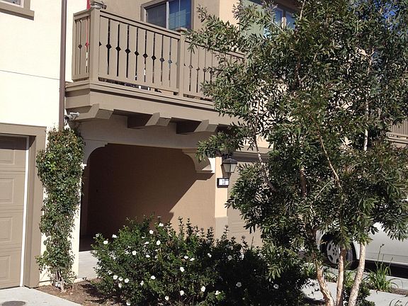 The upper portion is our home and the entrance is the portico you see