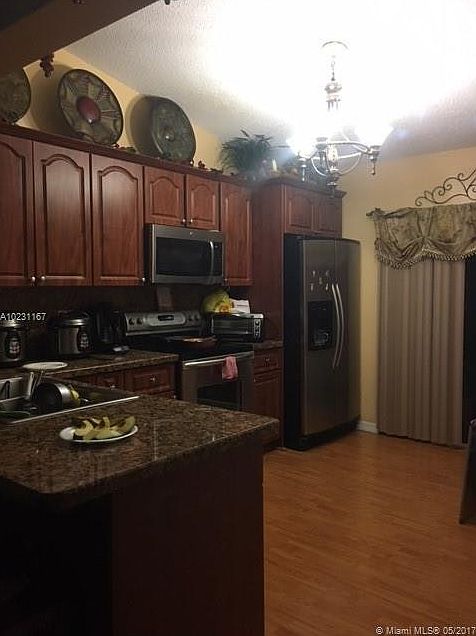 1st image of 7982 W 34th Ln Unit 202
