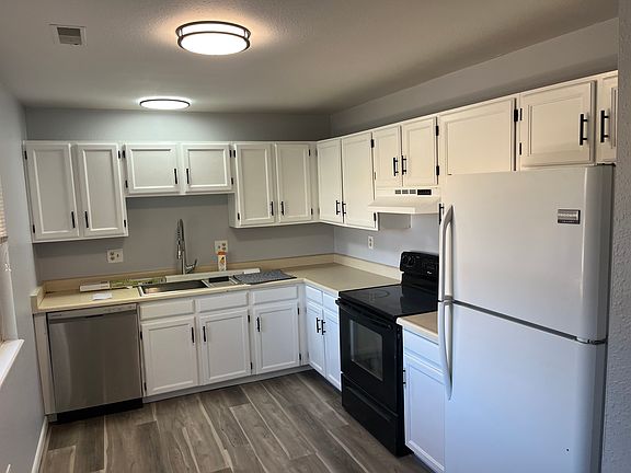 BRAND NEW flooring, lighting, Freshly Painted cabinets, Dishwasher only 1 years old. Brand new Luxury Faucet and also Brand New Trash Disposal.