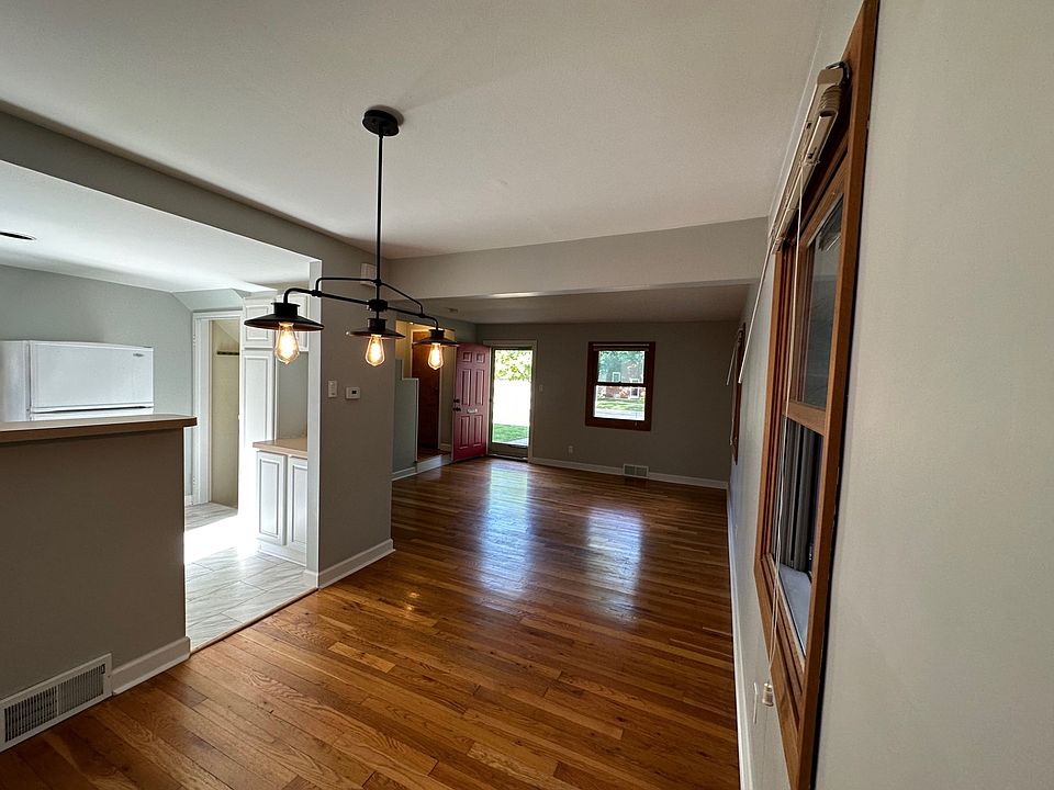 View from dining room corner. The front door is at the far end of the photo