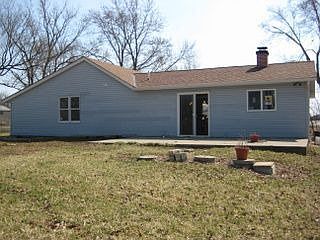 view of home from backyard.
