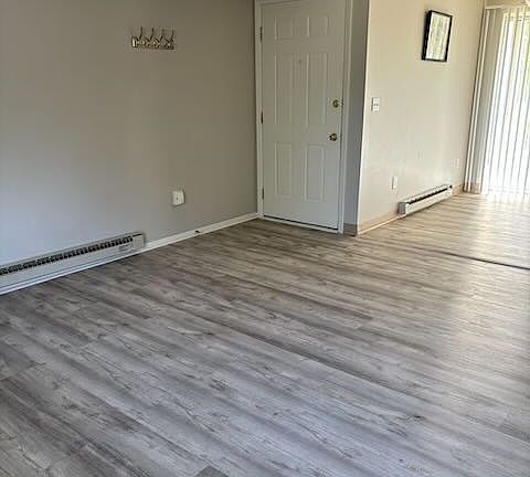From the front entrance, an open contemporary floor plan. Easy care LVP flooring in main areas.