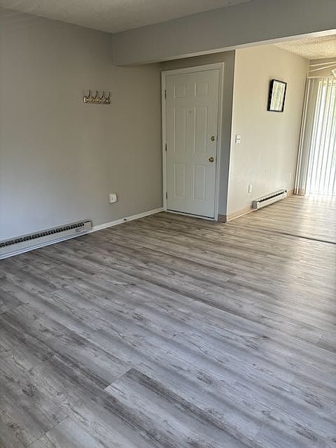 From the front entrance, an open contemporary floor plan. Easy care LVP flooring in main areas.