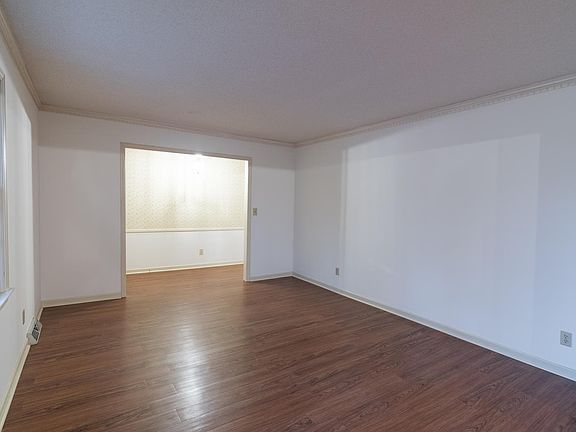 Lighted entry, front sitting room.