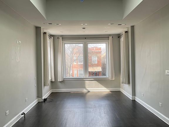 Living Room (looking from dining room) - HIGH CEILINGS/SKYLIGHTS