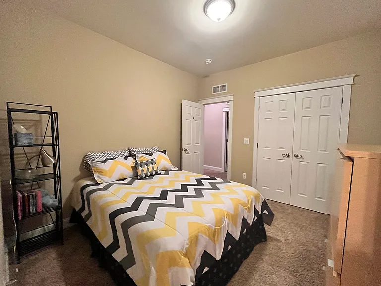 Bedroom 3 with private ensuite bathroom.