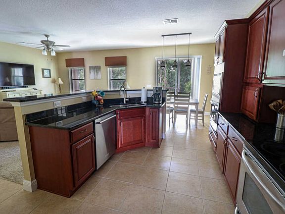 5th image of 5233 NW Wisk Fern Cir