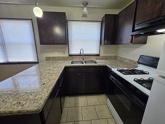 4th image of 8751 W 73rd Pl APT 2