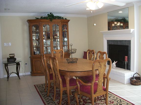 DINNING ROOM WITH WOOD BURNING FIREPLACE
