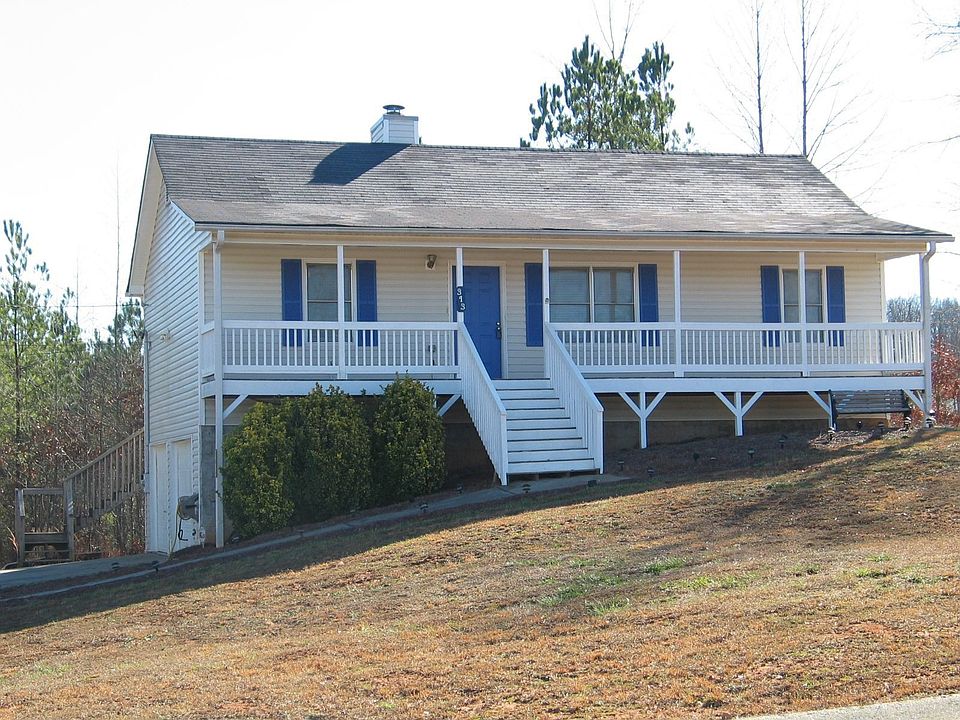 Ranch w/ finished basement and rocking chair front porch
