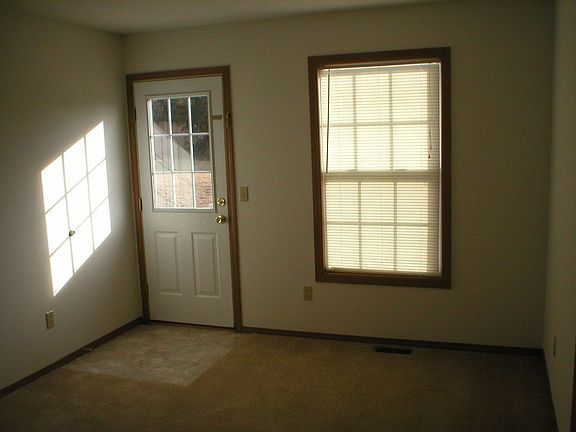 The 4th bedroom would be perfect for an office or kid's playroom. That door go