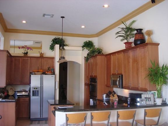 Huge kitchen with center island, granite countertops, stainless steel 