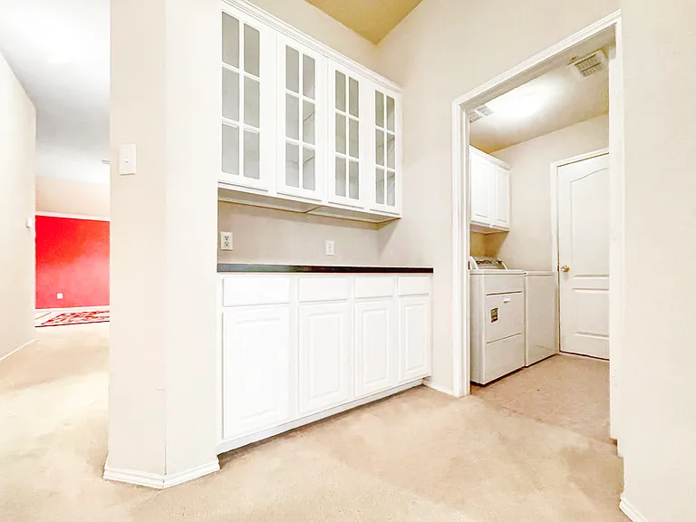 LOTS OF STORAGE and Laundry Room