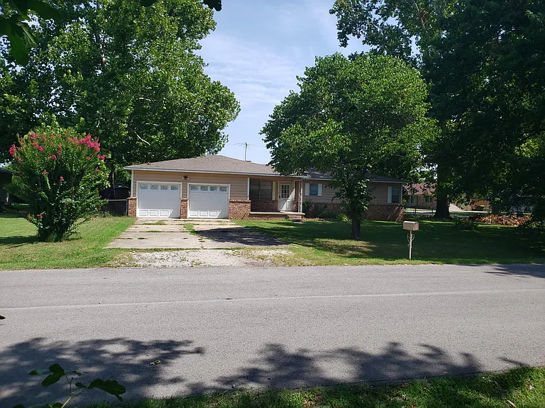 Two car garage with remotes.
