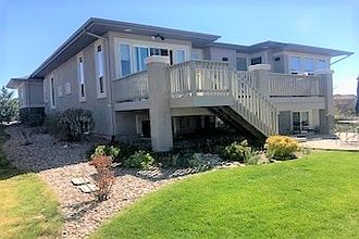 Back patio and raspberries